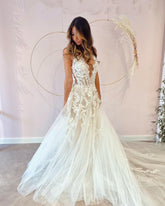 Elegant A-Line Deep V-Neck Backless Wedding Dress with Lace Appliques