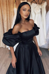 Elegant Black Mermaid Prom Dress with Bubble Sleeves and Strapless Design