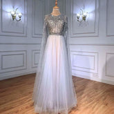 Elegant Long Sleeve Tulle Sequin Prom Dress with Fluttering A-Line Style