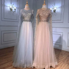 Elegant Long Sleeve Tulle Sequin Prom Dress with Fluttering A-Line Style