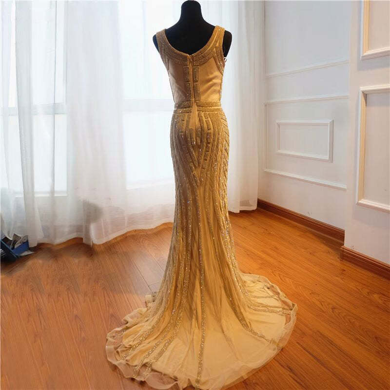 Gold Sequin Mermaid Prom Dress V Neck Long Sleeveless Evening Gown