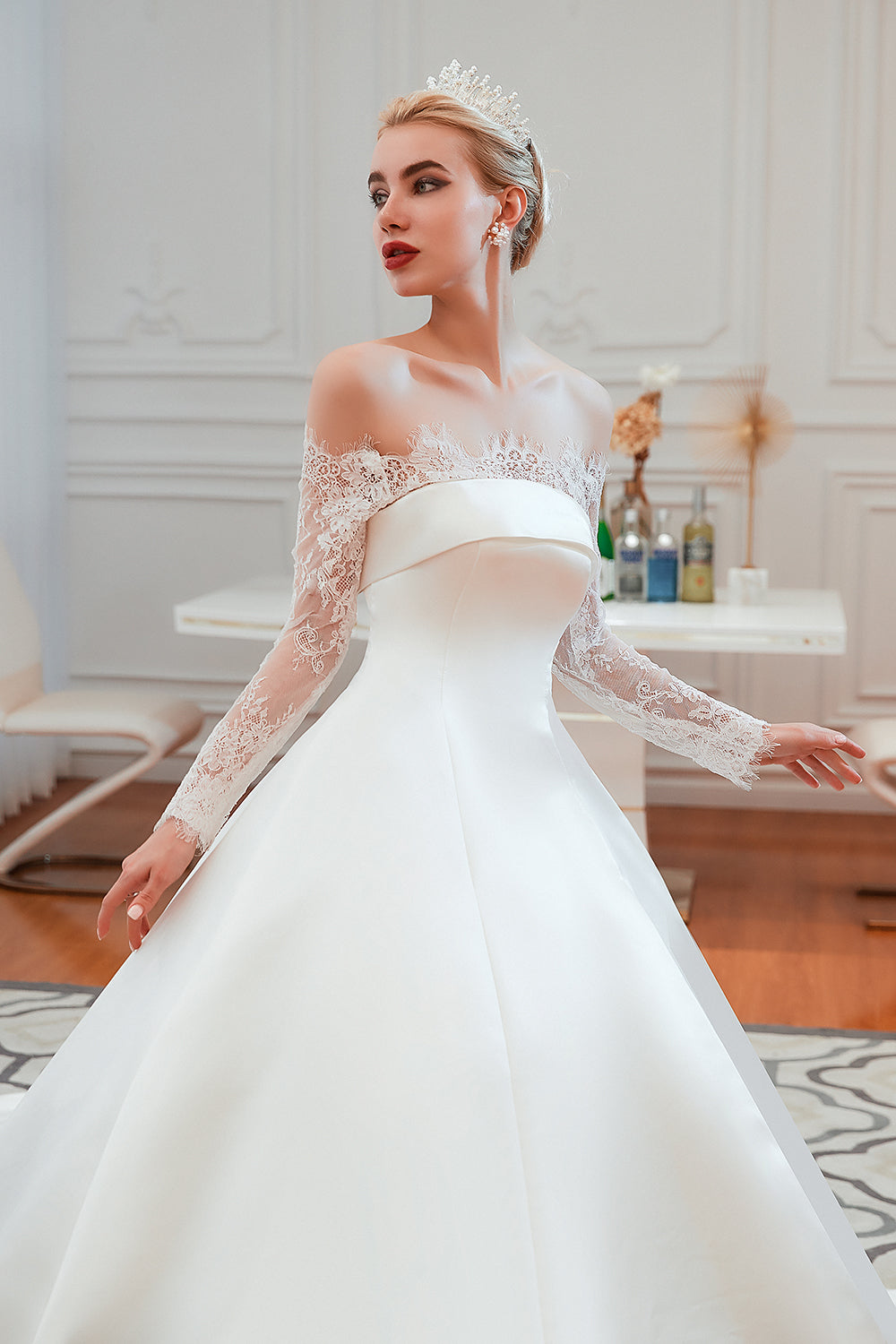 Elegant Off-Shoulder Long Sleeve A-Line Satin Wedding Gown with Delicate Lace