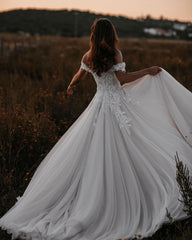Elegant Off-Shoulder A-Line Tulle Wedding Dress with Delicate Lace Appliques
