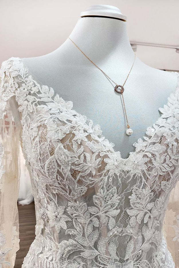 Sweetheart Princess Wedding Dress with Long Sleeves and Lace Appliques