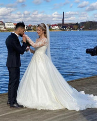 Elegant A-Line Sweetheart Wedding Dress with Long Sleeves and Lace