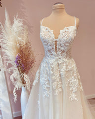 Elegant A-Line Tulle Wedding Dress with Delicate Lace Appliques and Straps