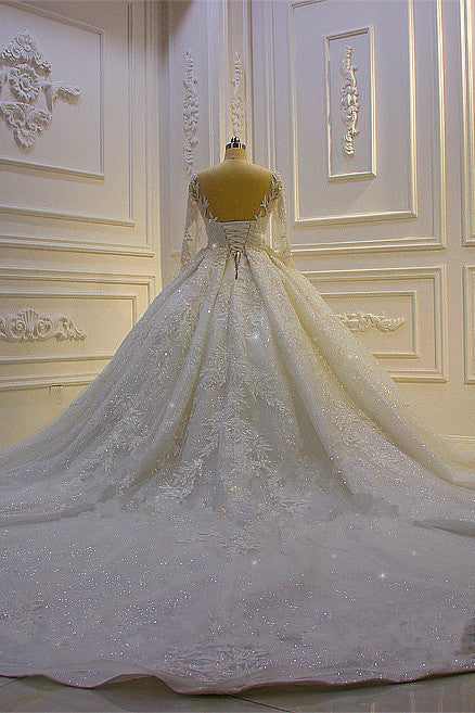 Elegant Long Sleeve Ball Gown Wedding Dress with Beaded Lace Appliques and Church Train Elegant Long Sleeve Ball Gown Wedding Dress with Beaded Lace Appliques and Church Train
