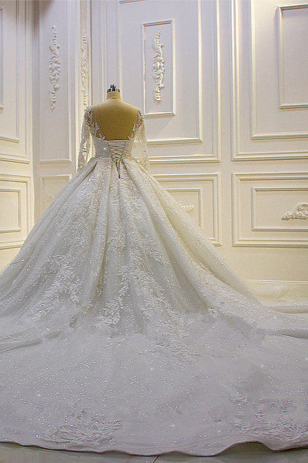 Elegant Long Sleeve Ball Gown Wedding Dress with Beaded Lace Appliques and Church Train