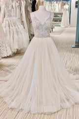 Elegant Backless A-Line Wedding Dress with Pearl V-Neck