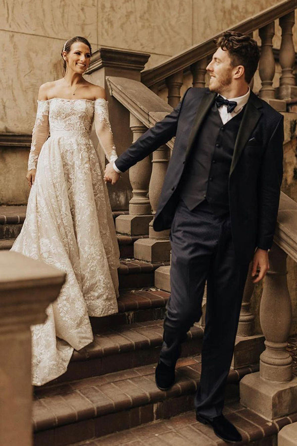 Enchanting Off-Shoulder A-Line Wedding Gown with Long Sleeves, Bow, and Lace