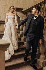 Enchanting Off-Shoulder A-Line Wedding Gown with Long Sleeves, Bow, and Lace