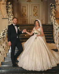 Elegant V-Neck Ball Gown Wedding Dress with Exquisite Lace Appliques