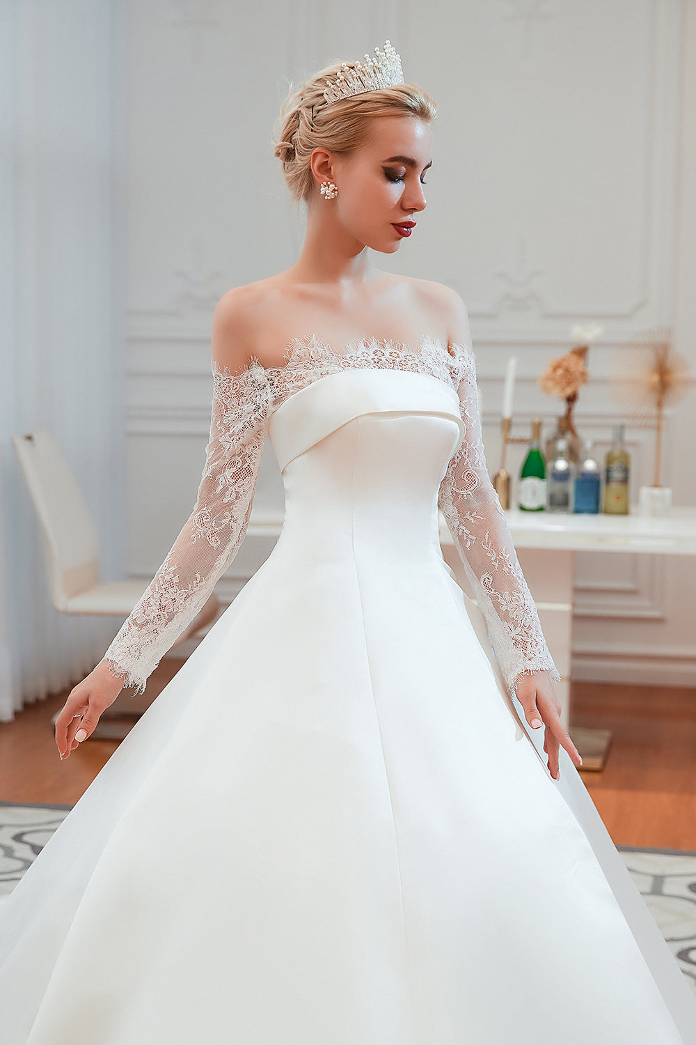 Elegant Off-Shoulder Long Sleeve A-Line Satin Wedding Gown with Delicate Lace