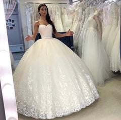 Elegant Spaghetti Strap A-Line Wedding Dress with Sequins and Lace