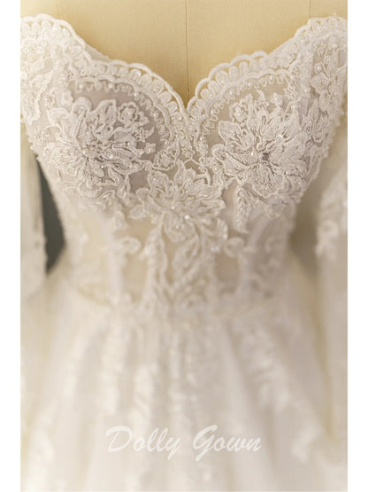 Off The Shoulder Lace A-line See Through Long Sleeve Wedding Dress - DollyGown