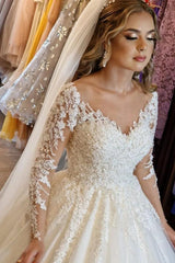 Elegant White A-Line V-Neck Lace Wedding Gown with Long Sleeves