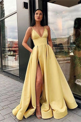 Elegant V-Neck Prom Dress with High Split, Pockets, and Flowing A-Line Skirt