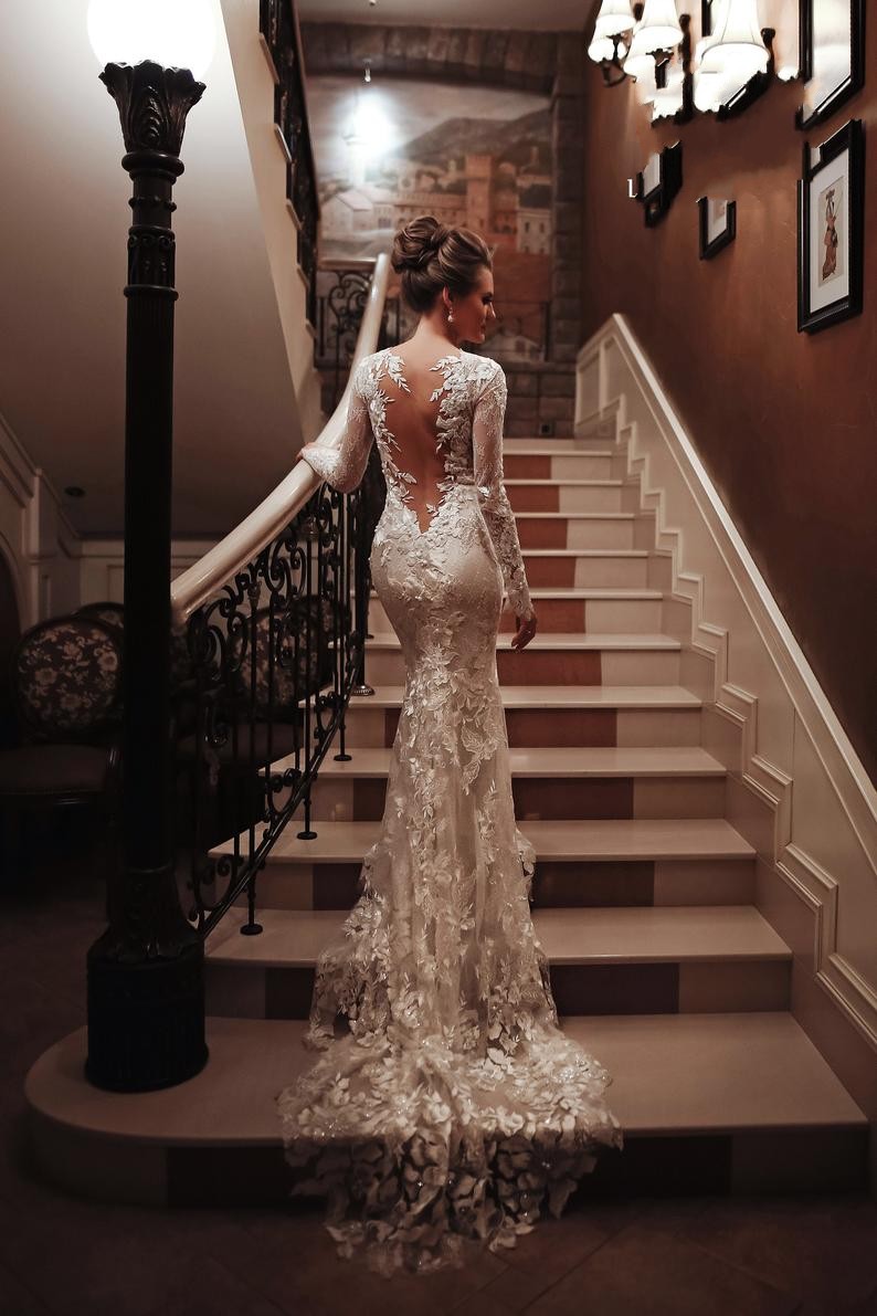 Elegant Long Sleeve High Neck Mermaid Wedding Dress with Lace Appliques