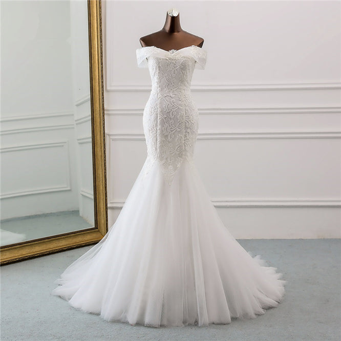 Elegant Off-the-Shoulder Mermaid Wedding Dress with Tulle and Lace Appliques