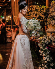 Elegant Off-Shoulder Long Sleeve Mermaid Wedding Gown with Exquisite Lace Appliques