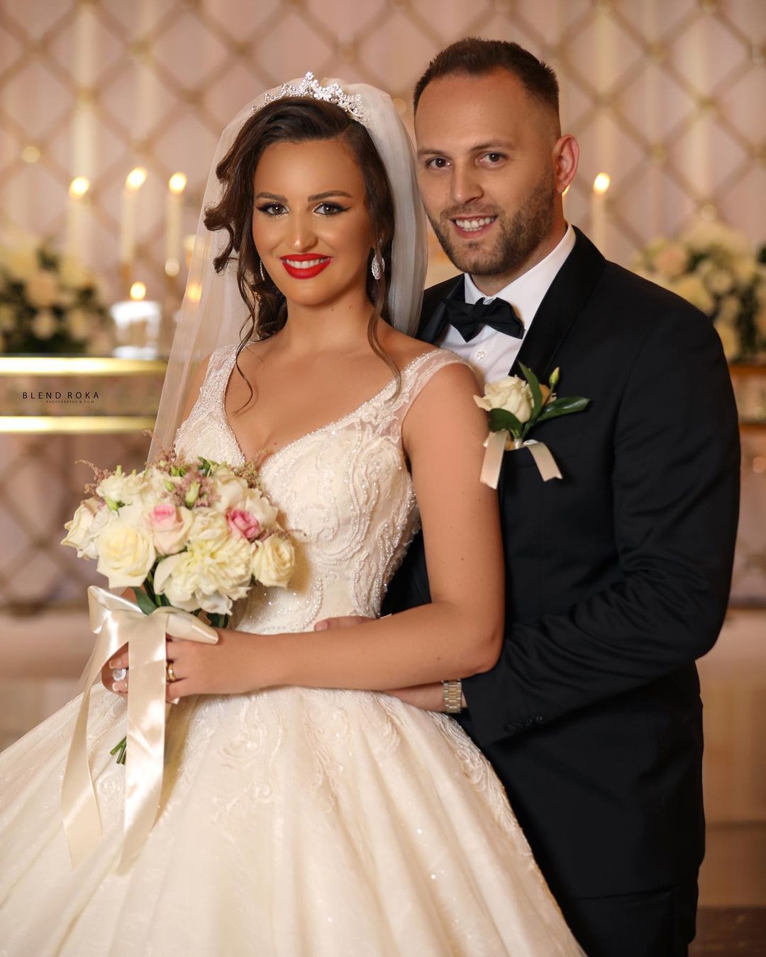 Elegant V-Neck Ball Gown Wedding Dress with Exquisite Lace Appliques
