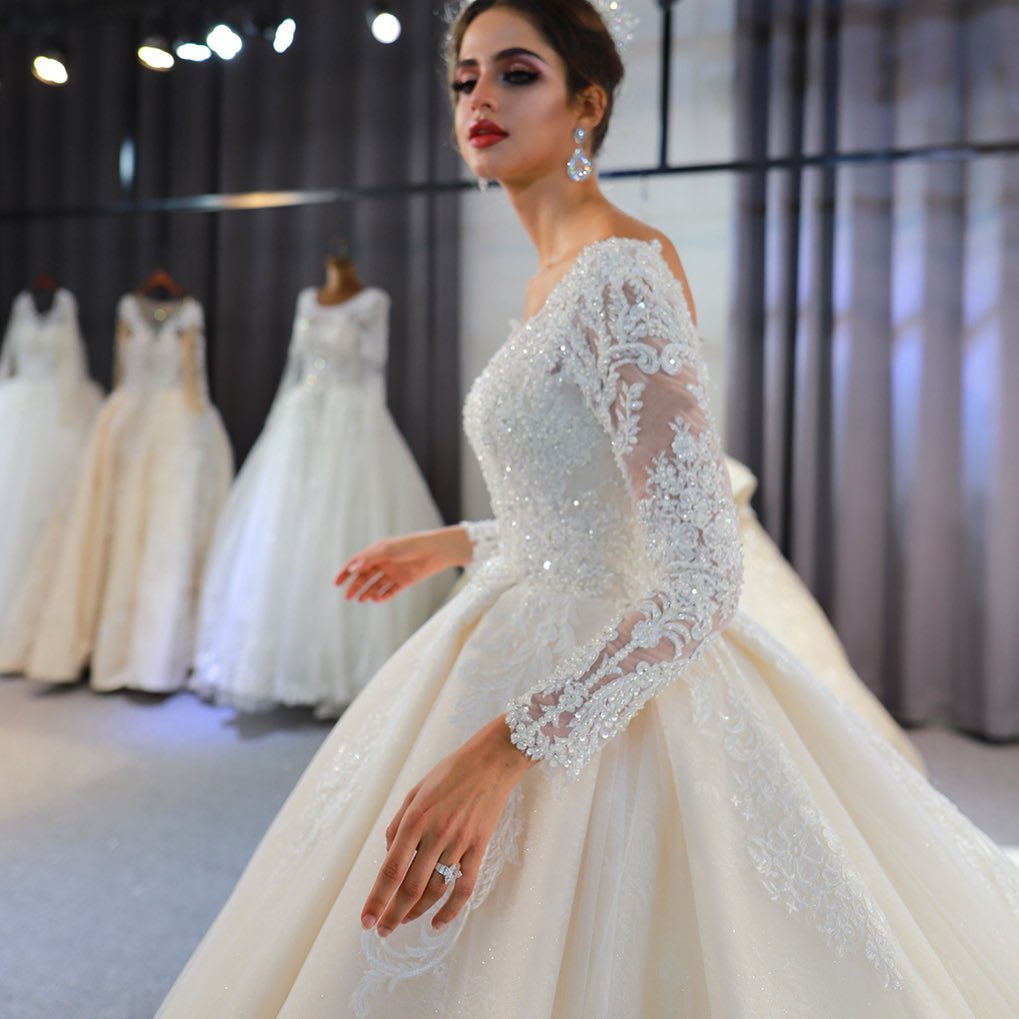 Elegant A-Line Sweetheart Wedding Dress with Long Sleeves, Lace Appliques & Sequins