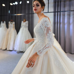 Elegant A-Line Sweetheart Wedding Dress with Long Sleeves, Lace Appliques & Sequins