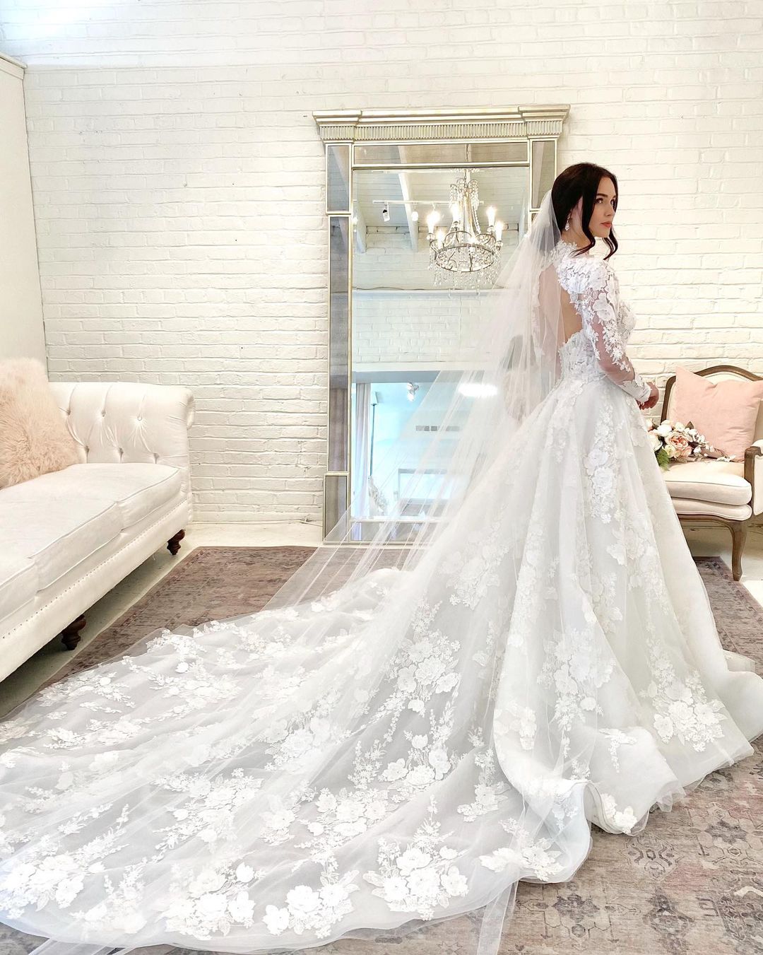 Elegant High-Neck A-Line Wedding Gown with Lace Sleeves and Open Back Design