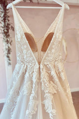 Elegant Deep V-Neck A-Line Tulle Wedding Gown with Delicate Floral Lace Appliques