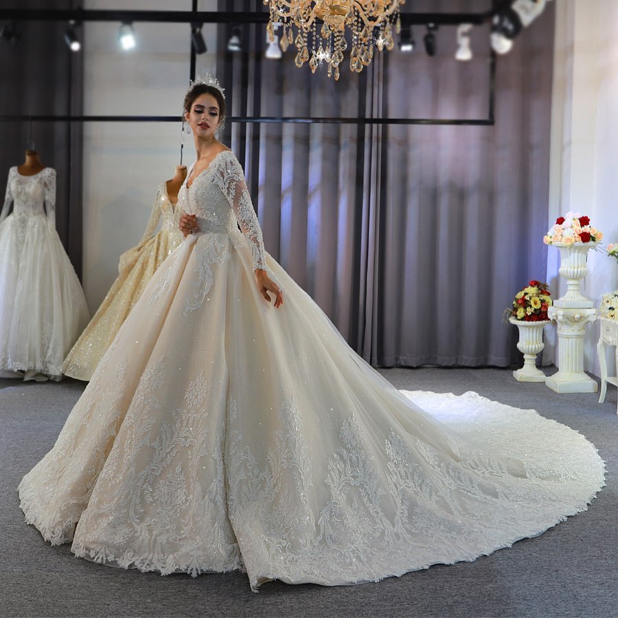 Elegant A-Line Sweetheart Wedding Dress with Long Sleeves, Lace Appliques & Sequins