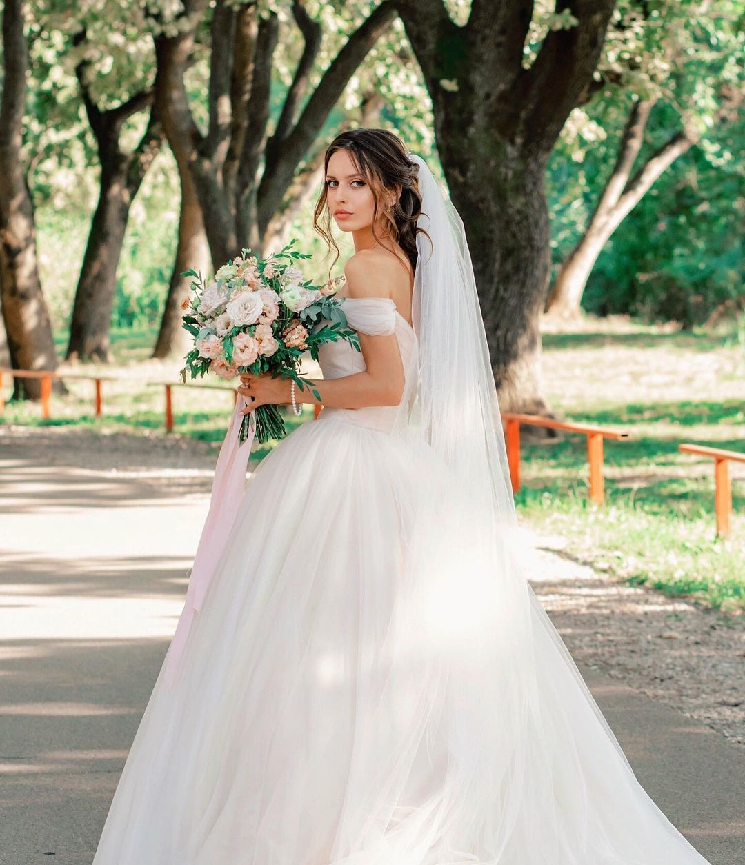 Elegant Off-Shoulder Tulle A-Line Wedding Dress with Chapel Train