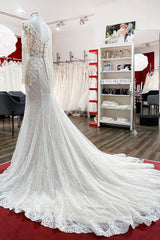 Sweetheart Princess Wedding Dress with Long Sleeves and Lace Appliques