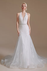 Elegant Mermaid Halter Tulle Wedding Gown with Lace Appliques and Floor-Length Design