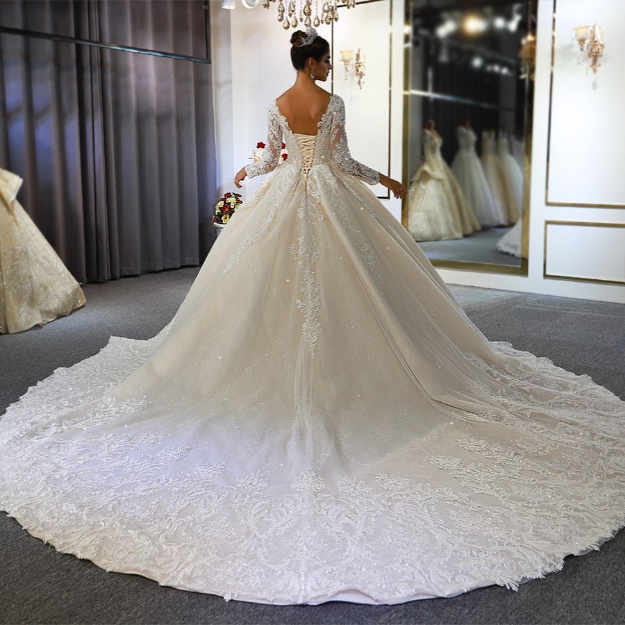 Elegant A-Line Sweetheart Wedding Dress with Long Sleeves, Lace Appliques & Sequins
