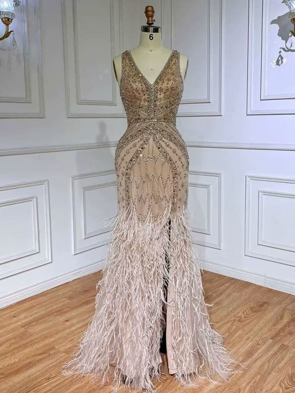 Elegant Green Sequin Prom Dress with Beaded V-Neck and Feather Accents