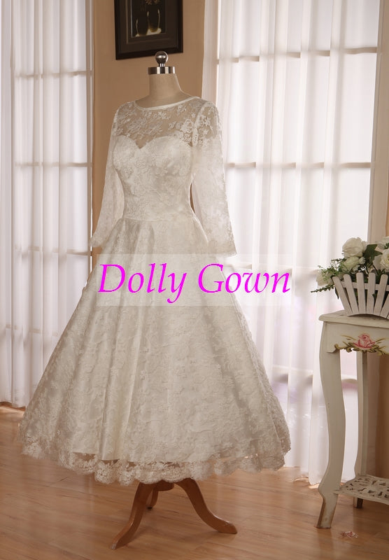 Classic Vintage Audrey Hepburn 1950s Tea Length Lace Wedding Dress with Sleeves Classic Vintage Audrey Hepburn 1950s Tea Length Lace Wedding Dress with Sleeves